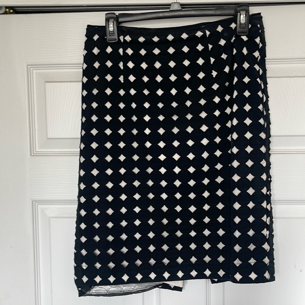 Women’s White House, black market polkadot overlay skirt. Size 8.